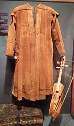 Leather coat and violin.